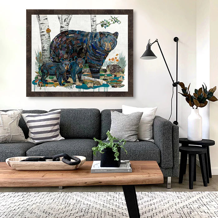Paper collage of mama bear with cubs in blue tones with aspen trees