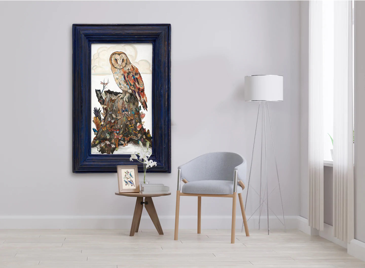 Barn owl paper collage in bright blue frame by artist Dolan Geiman