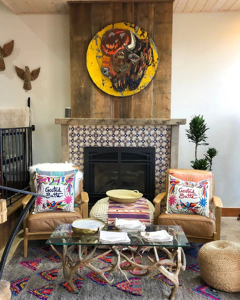 King Bison Metal Wall Sculpture by Dolan Geiman, the centerpiece of this fireplace mantle in Crested Butte, Colorado