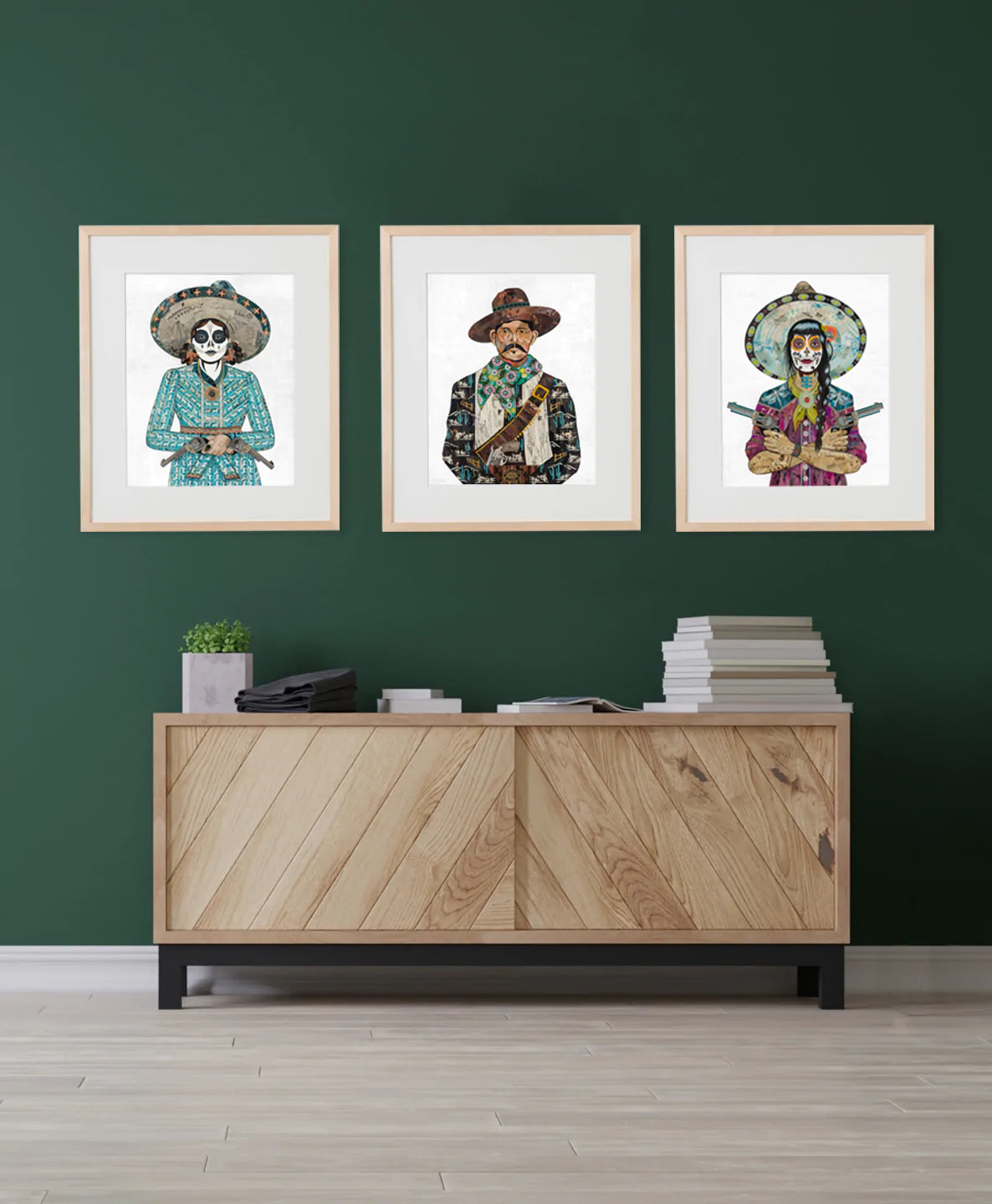 Set of three paper art prints of Vaquera cowgirls with sugar skull makeup and guns and a cowboy in vest