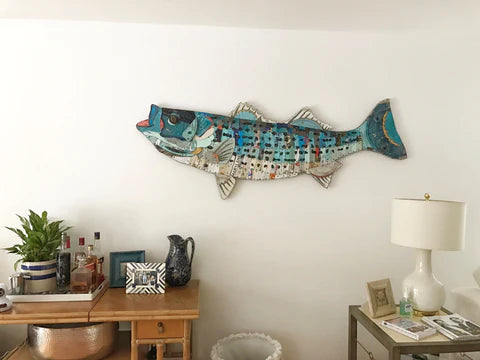 Striped bass 2D metal wall sculpture in blue and teal. Art by Dolan Geiman.