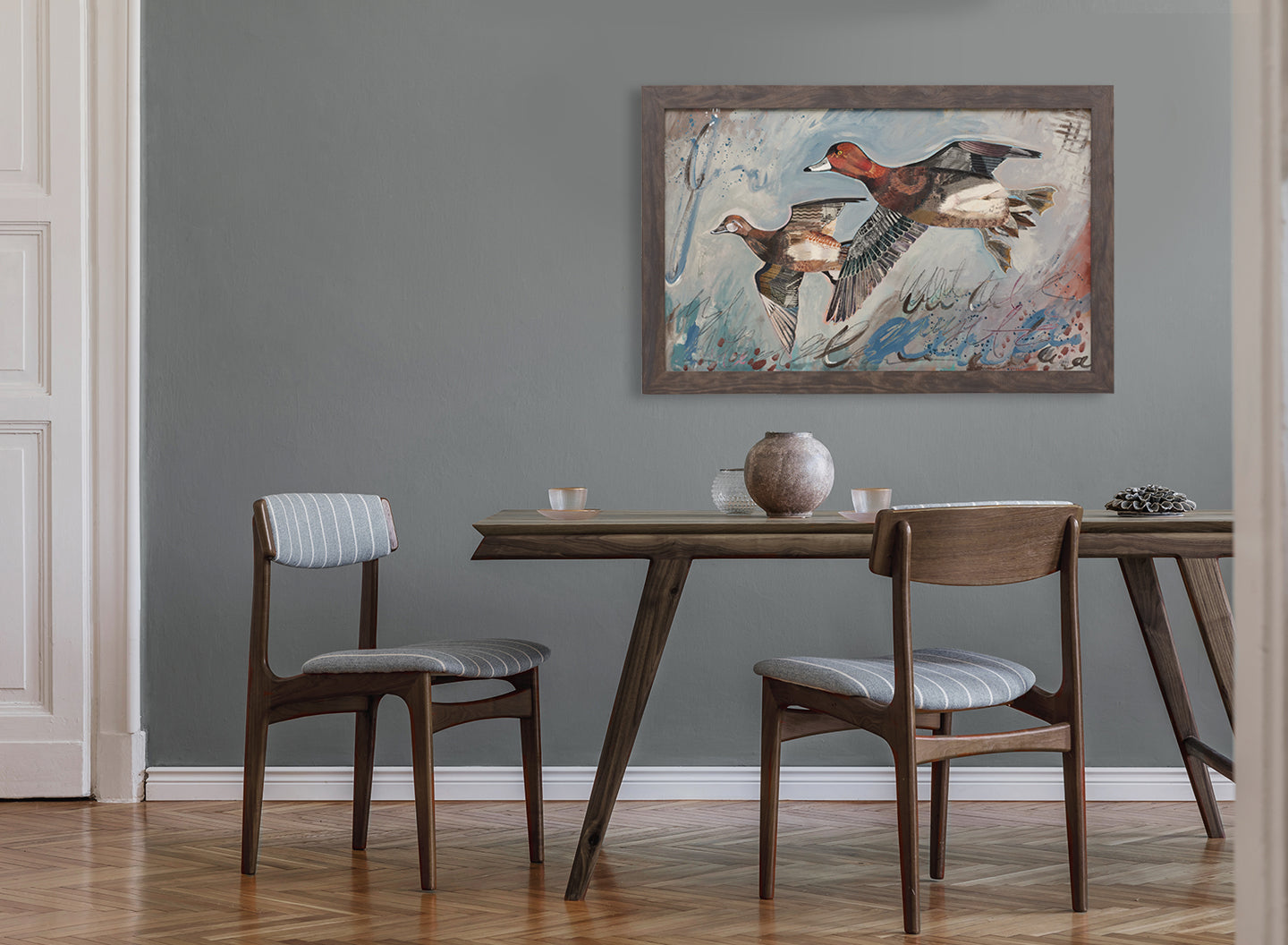 Dolan Geiman collage painting features redhead ducks in flight against an abstract backdrop of blue and grey hues. Rich, textured mixed media entitled Winter Redheads