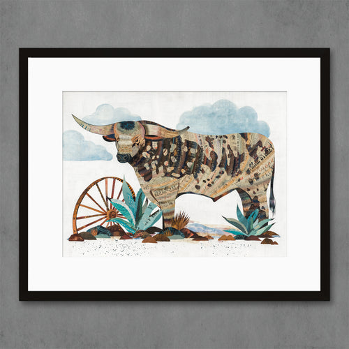 cow wall art features longhorn in field with wagon wheel