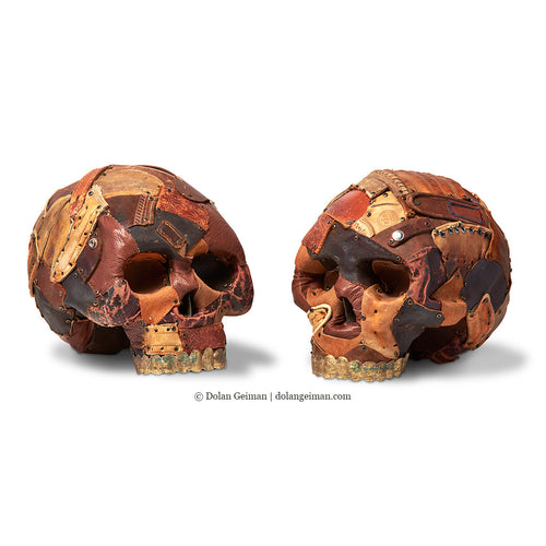 human skull sculptures replicas in leather by Dolan Geiman